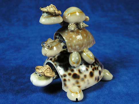 Bobble head turtle trio novelty made from real seashells.